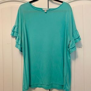 Cute blue top with ruffle sleeves.